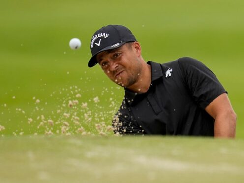 Xander Schauffele hits from the bunker on the sixth hole during the second round of the US PGA Championship (Sue Ogrocki/AP)