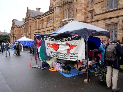 Protesting students occupy an area of the quadrangle at the University of Sydney (Rick Rycroft/AP)