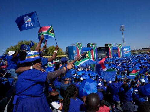 Supporters of the main opposition Democratic Alliance (DA) party attend a final election rally, in Benoni, South Africa (Themba Hadebe/AP)