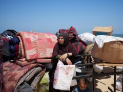 Displaced Palestinians arrive in central Gaza after fleeing from the southern Gaza city of Rafah in Deir al Balah, Gaza Strip (Abdel Kareem Hana/AP)