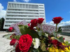 Flowers are placed outside the FD Roosevelt University Hospital, where Slovak Prime Minister Robert Fico is being treated, in Banska Bystrica, central Slovakia (Lefteris Pitarakis/AP)