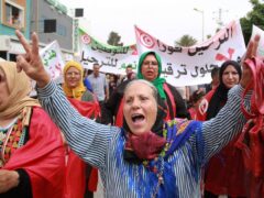 Tunisians take part in a protest against the presence of sub-Saharan migrants (Houssem Zouari/AP)