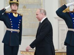 Russian President Vladimir Putin arrives at a ceremony (Sergei Guneyev/AP)