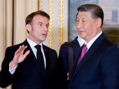 French President Emmanuel Macron talks with Chinese President Xi Jinping (Ludovic Marin via AP)