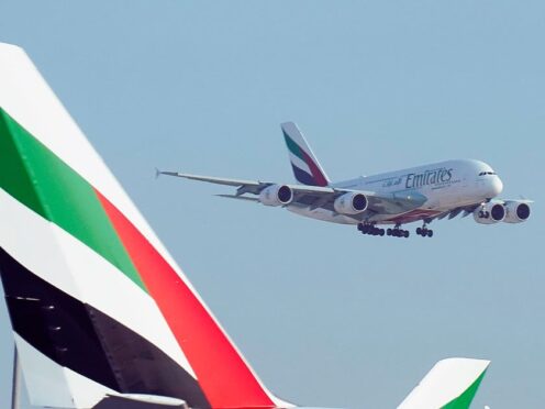 An Emirates Airbus A380 jumbo jet lands at Dubai International Airport in Dubai, United Arab Emirates (Jon Gambrell/AP)