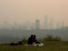 Smoke from nearby wildfires blankets the city of Edmonton, Alberta (Jason Franson/The Canadian Press/AP)