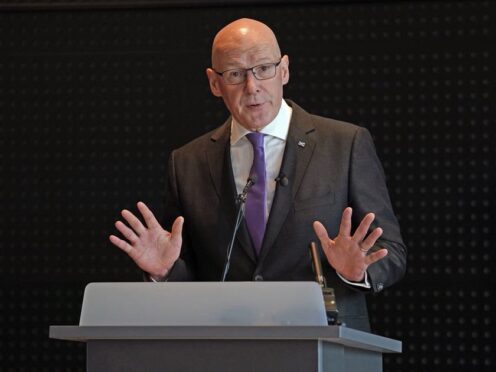 John Swinney has hit out at the UK Government’s approach to migration (Andrew Milligan/PA)