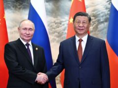 Chinese President Xi Jinping and Russian President Vladimir Putin pose for a photo (Sergei Guneyev, Sputnik, Kremlin Pool Photo via AP)