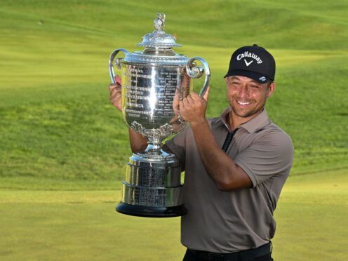Xander Schauffele holds the Wanamaker Trophy after winning the US PGA Championship at Valhalla (Jon Cherry/AP)