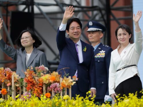 New Taiwan President Lai Ching-te, centre, vice president Hsiao Bi-khim, right, and former president Tsai Ing-wen (Chiang Ying-ying/AP)