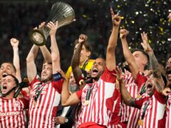 Ayoub El Kaabi (centre) celebrates after his extra-time goal gave Olympiacos victory in the Europa Conference League final against Fiorentina (Petros Giannakouris/AP)
