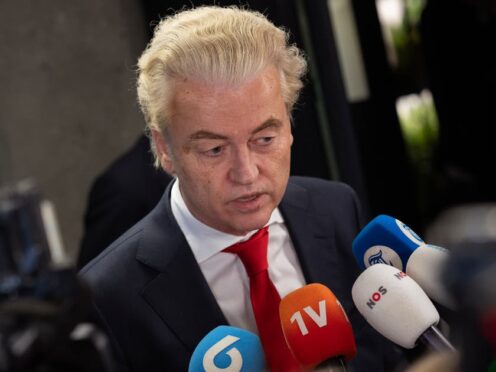 Geert Wilders, leader of the far-right party PVV, or Party for Freedom, talks to the media (Peter Dejong/AP)