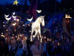 A parade during the Bealtaine Fire Festival at the Hill of Uisneach in Co Westmeath (Niall Carson/PA)