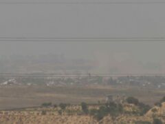 A screenshot taken from AP video showing a general view of northern Gaza as seen from southern Israel, before it was seized by Israeli officials (AP)