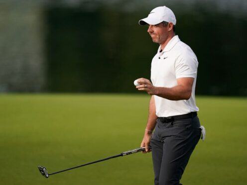 Rory McIlroy, of Northern Ireland, waves after making a putt on the 17th hole during the first round of the Wells Fargo Championship golf tournament at Quail Hollow on Thursday, May 9, 2024, in Charlotte, North Carolina (Erik Verduzco/AP)