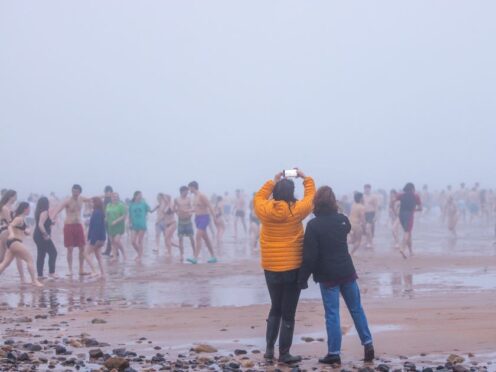 The students took a May Day dip (University of St Andrews/PA)