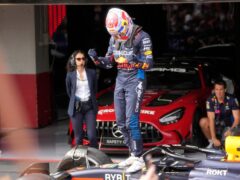 Max Verstappen celebrates his latest win (Luca Bruno/AP)