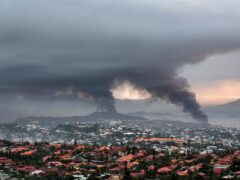 Smoke rises during protests in Noumea, New Caledonia, on May 15 (Nicolas Job/AP)