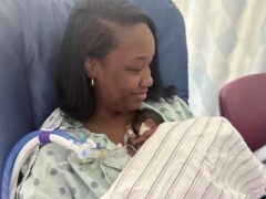 NaKeya Haywood holding six-month-old Nyla Brooke Haywood at Silver Cross Hospital in New Lenox, Illinois (NaKeya Haywood via AP)
