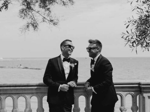 Scott Mills and Sam Vaughan at their wedding (Laura Onac/PA)