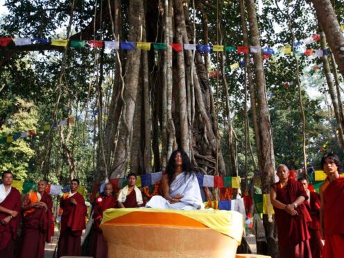 Ram Bahadur Bamjan, centre in white, believed by some to be the reincarnation of Buddha, is surrounded by Buddhist monks in Nijgadh town, south of Katmandu, Nepal, in November 2008 (Binod Joshi/AP)
