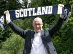 First Minister John Swinney announced a funding boost for a scheme which involves local football clubs in tackling child poverty (Lesley Martin/PA)