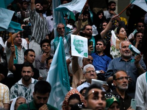 Supporters of reformist candidate for Iran’s presidential election Masoud Pezeshkian attend his campaign meeting in Tehran, Iran, Sunday, June 23, 2024 (Vahid Salemi/AP)