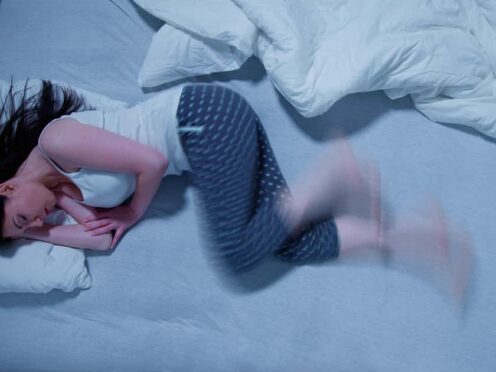 A woman With RLS – Restless Legs Syndrome (Alamy/PA)