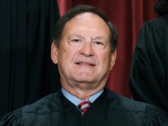 Justice Samuel Alito joins other members of the Supreme Court as they pose for a new group portrait (J Scott Applewhite/AP)