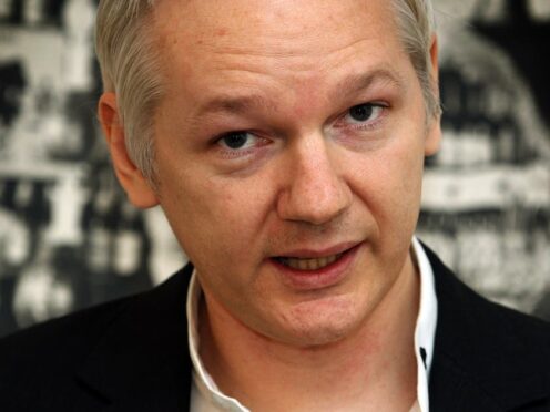 Julian Assange has left prison and flown out of the UK, WikiLeaks said (PA)