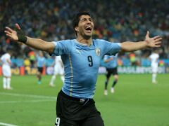 Luis Suarez scored twice as Uruguay left England on the brink of elimination from the 2014 World Cup (Mike Egerton/PA)