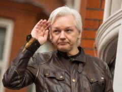 Julian Assange has left Belmarsh Prison and flown out the UK, WikiLeaks said (PA)