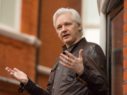 Julian Assange has been freed from Belmarsh Prison and has left the UK, WikiLeaks said (PA)