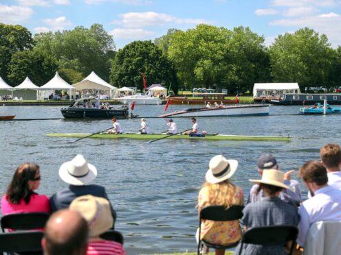 Spectators on the opening day of the 2019 Henley Royal Regatta alongside the river Thames (File photo/Steve Parsons/PA)