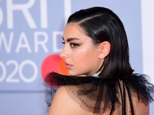 Charli XCX has hit out at fans chanting against Taylor Swift (Ian West/PA)