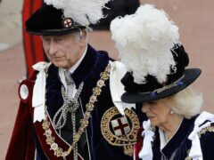 The King and Queen at the annual Order of the Garter Service at St George’s Chapel last year (John Phillips/PA)
