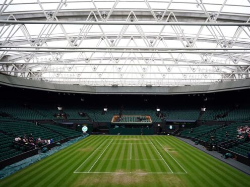 The roof over centre court at Wimbledon was closed for the first time on this day in 2009 (Zac Goodwin/PA)