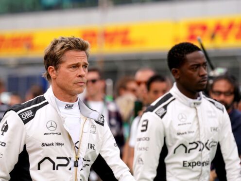 Brad Pitt and Damson Idris filming for a movie (Tim Goode/PA)