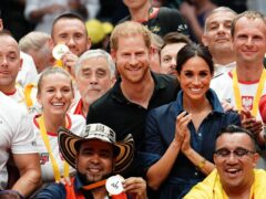 The Duke and Duchess of Sussex with medal winners during the Invictus Games in Dusseldorf, Germany (Jordan Pettitt/PA)