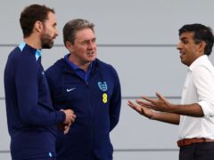 Prime Minister Rishi Sunak (right) speaks to England manager Gareth Southgate (left) during a visit to St George’s Park (Darren Staples/PA)