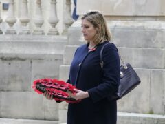 Penny Mordaunt, MP for Portsmouth North, lays a wreath at the war memorial following a Remembrance Sunday service in Guildhall Square, Portsmouth (Andrew Matthews/PA)
