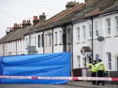 Police at a property in Collingwood Road, Sutton, south London, where brothers Kyson and Bryson Hoath, aged four, and Leyton and Logan Hoath, aged three, died in a fire (Yui Mok/PA)