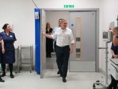 Labour leader Sir Keir Starmer and shadow health secretary Wes Streeting meet staff during a hospital visit (Joe Giddens/PA)