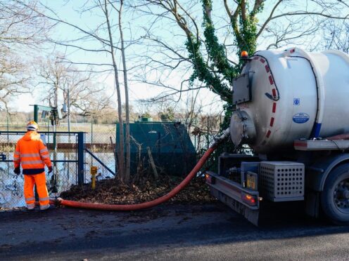 A tanker pumps out excess sewage from the Lightlands Lane sewage pumping station in Cookham, Berskhire (Andrew Matthews/PA)