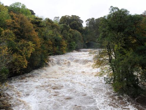 A general view of the fast flowing and swollen River Ure at Aysgarth Falls, North Yorkshire (Anna Gowthorpe/PA)