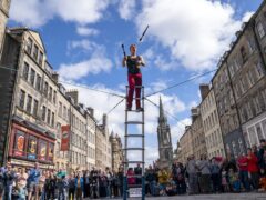 A street performer on Edinburgh’s Royal Mile during the city’s Festival Fringe (Jane Barlow/PA)