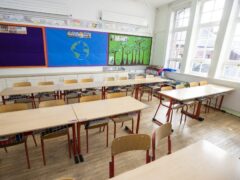 The Conservative manifesto acknowledged that fewer children have been attending school due to the legacy of Covid-19 (PA)