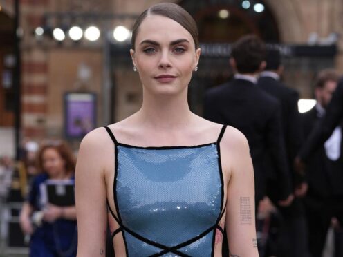 Cara Delevingne has reflected on her experience performing in Cabaret (Ian West/PA)