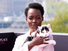 Lupita Nyong’o and cat Schnitzel during a photocall for A Quiet Place: Day One. (Ian West/PA)