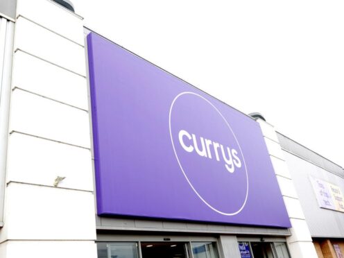 Currys has hailed a return to an annual profit after shedding business costs (Currys/PA)